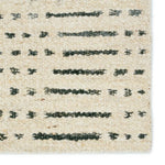 The texture-rich Leona Elver offers an assortment of updated kilim looks, re-invented with the on-trend shearling style and neutral, modern palettes. The handwoven Elver rug features a globally inspired, gray dot and ticking line pattern on a neutral tan base. Amethyst Home provides interior design, new home construction design consulting, vintage area rugs, and lighting in the San Diego metro area.