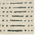 The texture-rich Leona Elver offers an assortment of updated kilim looks, re-invented with the on-trend shearling style and neutral, modern palettes. The handwoven Elver rug features a globally inspired, gray dot and ticking line pattern on a neutral tan base. Amethyst Home provides interior design, new home construction design consulting, vintage area rugs, and lighting in the San Diego metro area.