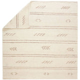 The texture-rich Leona Essek offers an assortment of updated kilim looks, re-invented with the on-trend shearling style and neutral, modern palettes. The handwoven Essek rug features a globally inspired, light brown, stripe and tribal pattern on a neutral cream base. Amethyst Home provides interior design, new home construction design consulting, vintage area rugs, and lighting in the Kansas City metro area.