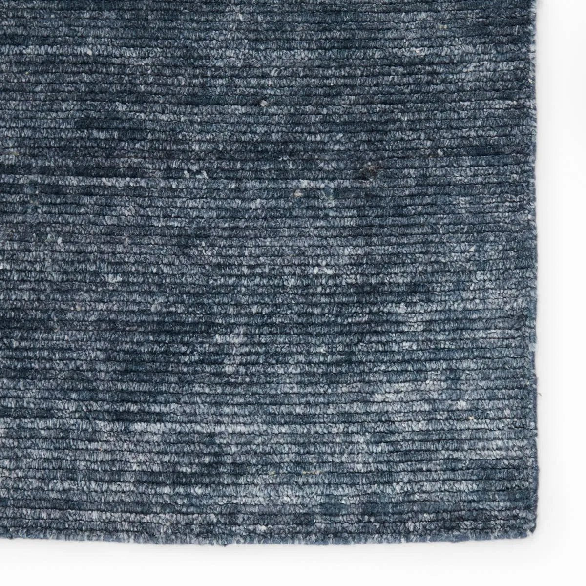 Silky and soothing underfoot, the luxurious Linnet Ardis boasts an opulent sheen and stunning, indulgent feel. The hand-loomed Ardis rug is crafted of sumptuous rayon made from bamboo, offering a virtually shed-free and more durable option for bedrooms and living spaces. Amethyst Home provides interior design, new home construction design consulting, vintage area rugs, and lighting in the Houston metro area.