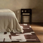 The hand-tufted Anthem Noverre makes a bold statement with contemporary aesthetics and modern Brutalist influences. The Noverre design stands out with its striking high-low texture, plush feel, and subtle sheen that enhances its dynamic pattern. Amethyst Home provides interior design, new home construction design consulting, vintage area rugs, and lighting in the Charlotte metro area.