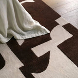 The hand-tufted Anthem Noverre makes a bold statement with contemporary aesthetics and modern Brutalist influences. The Noverre design stands out with its striking high-low texture, plush feel, and subtle sheen that enhances its dynamic pattern. Amethyst Home provides interior design, new home construction design consulting, vintage area rugs, and lighting in the Dallas metro area.