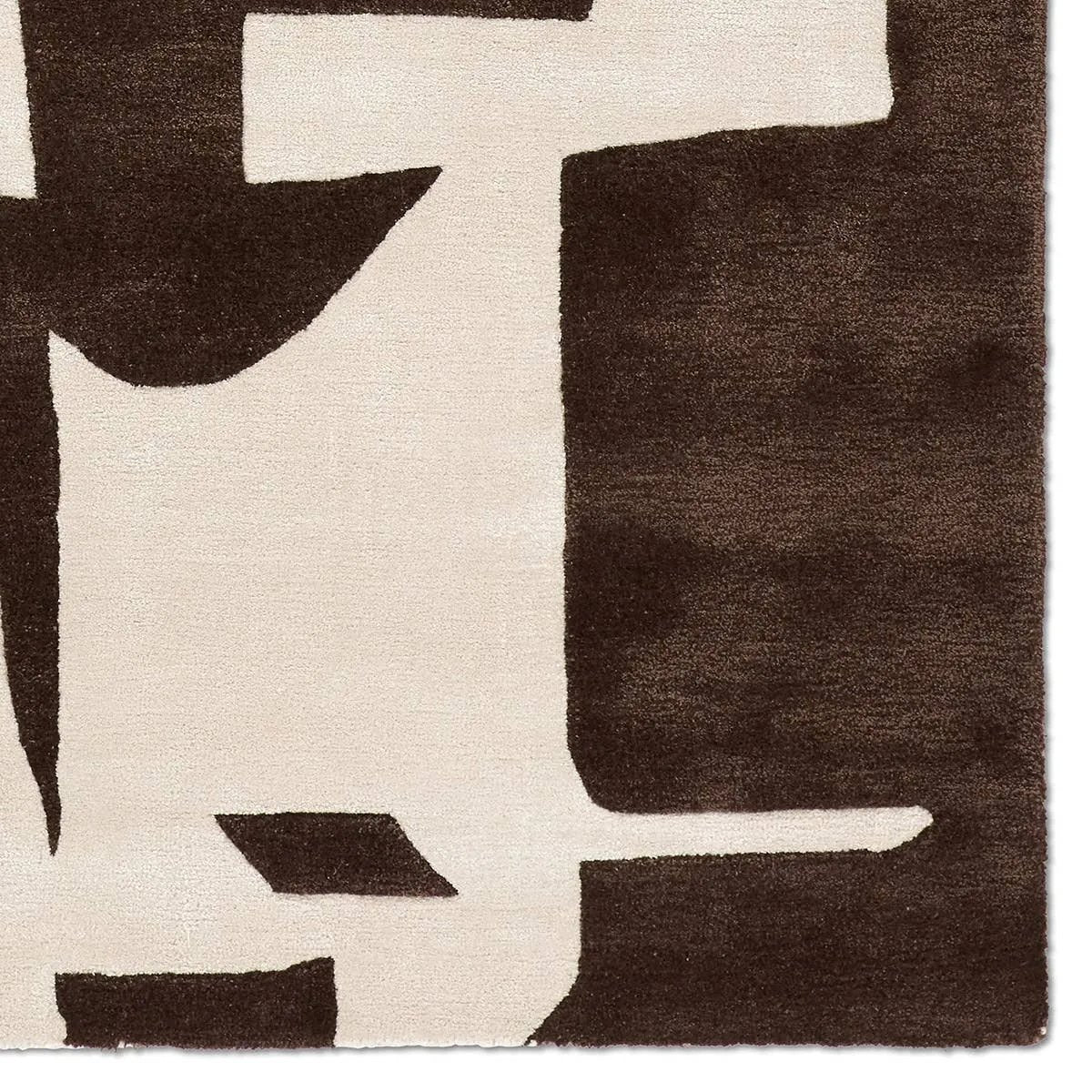 The hand-tufted Anthem Noverre makes a bold statement with contemporary aesthetics and modern Brutalist influences. The Noverre design stands out with its striking high-low texture, plush feel, and subtle sheen that enhances its dynamic pattern. Amethyst Home provides interior design, new home construction design consulting, vintage area rugs, and lighting in the Tampa metro area.