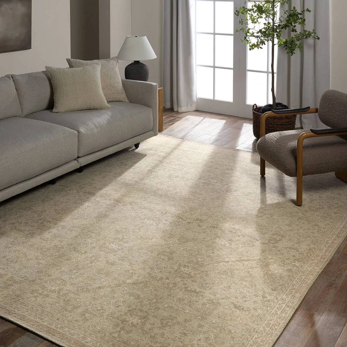 Featuring Onessa Delwyn Hand-Knotted Rug by Jaipur Living at Amethyst Home. The Onessa Delwyn marries traditional motifs with soft, subdued colorways for the perfect blend of fresh and time-honored style. These hand-knotted wool rugs feature hand-sheared quality with a coveted vintage look. The Delwyn rug features subtle floral patterns in shades of cream and g. Amethyst Home provides interior design, new home construction design consulting, vintage area rugs, and lighting in the Tampa metro area.
