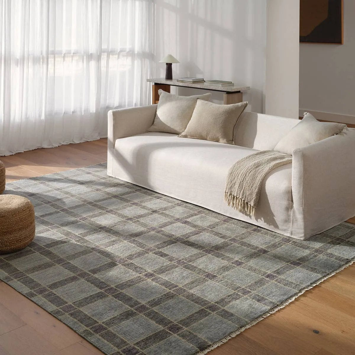 The Quinlan design reinvents timeless geometric grid patterns, fusing classic charm with a modern edge. Its beautiful blue hue elevates any mid-century modern space, while the 100% wool construction offers natural stain resistance. Stylish and durable, this piece is designed to stand the test of time.Hand Knotte Amethyst Home provides interior design, new home construction design consulting, vintage area rugs, and lighting in the Charlotte metro area.