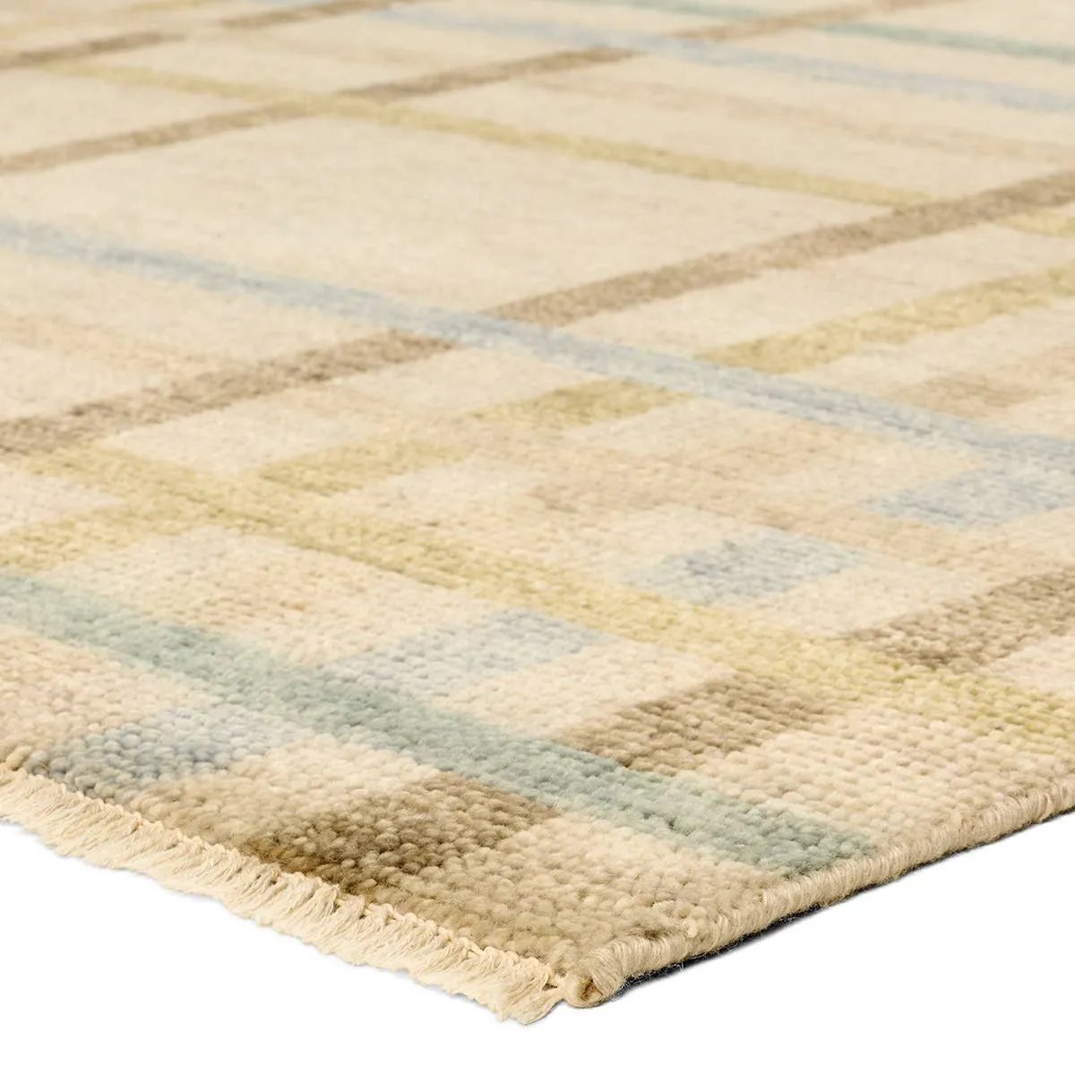 The Raza design reinvents the timeless plaid pattern, fusing classic charm with a modern edge. Soft beige tones, punctuated by a blue accent, elevate any mid-century modern space. Handcrafted from naturally stain-resistant wool, this rug handles medium-traffic areas, kids, and pets with ease. Amethyst Home provides interior design, new home construction design consulting, vintage area rugs, and lighting in the Miami metro area.
