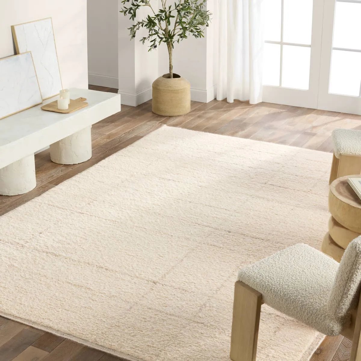 Featuring Repose Nasim Hand-Knotted Rug by Jaipur Living at Amethyst Home. The inviting and traditionally inspired Repose Nasim marries stunning artisan quality and the beauty of natural, undyed wool. The Sherpa-like, hand-knotted construction of the Nasim rug boasts a plush texture underfoot and is perfect for adding warmth and coziness to a space. The neu. Amethyst Home provides interior design, new home construction design consulting, vintage area rugs, and lighting in the Charlotte metro area.