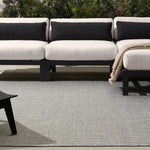 Featuring Sacdecer Avore Rug by Jaipur Living at Amethyst Home. The Sacdecer Avore is an exceptional handwoven indoor/outdoor rug, blending high-performance style with eco-conscious materials. Hand crafted in India from 100% PET yarn, sourced from recycled plastic bottles, it's both durable and environmentally friendly. Designed to withstand outdoor elements a. Amethyst Home provides interior design, new home construction design consulting, vintage area rugs, and lighting in the Austin metro area.
