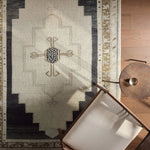 The Stellar design merges timeless tradition with a vintage-inspired aesthetic. Featuring a striking central medallion, this rug is set against an elegant beige and black backdrop, accented by rich green detailing. Its classic pattern, paired with a gently distressed finish, creates an heirloom quality.Hand Tufte Amethyst Home provides interior design, new home construction design consulting, vintage area rugs, and lighting in the Nashville metro area.