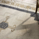 The Stellar design merges timeless tradition with a vintage-inspired aesthetic. Featuring a striking central medallion, this rug is set against an elegant beige and black backdrop, accented by rich green detailing. Its classic pattern, paired with a gently distressed finish, creates an heirloom quality.Hand Tufte Amethyst Home provides interior design, new home construction design consulting, vintage area rugs, and lighting in the Park City metro area.