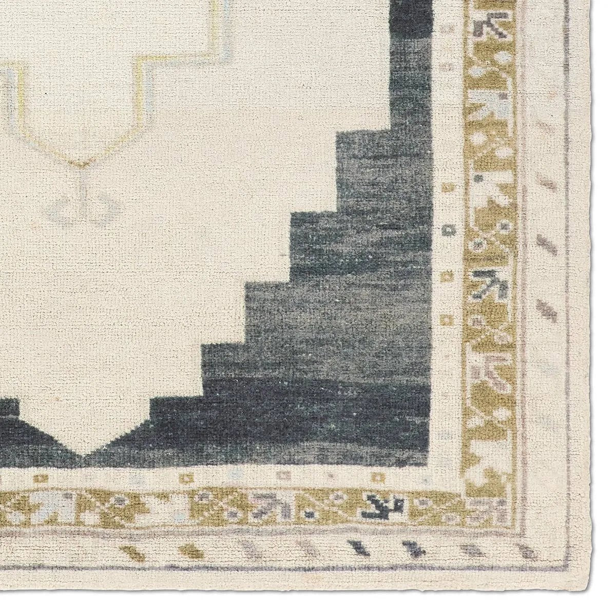 The Stellar design merges timeless tradition with a vintage-inspired aesthetic. Featuring a striking central medallion, this rug is set against an elegant beige and black backdrop, accented by rich green detailing. Its classic pattern, paired with a gently distressed finish, creates an heirloom quality.Hand Tufte Amethyst Home provides interior design, new home construction design consulting, vintage area rugs, and lighting in the Washington metro area.