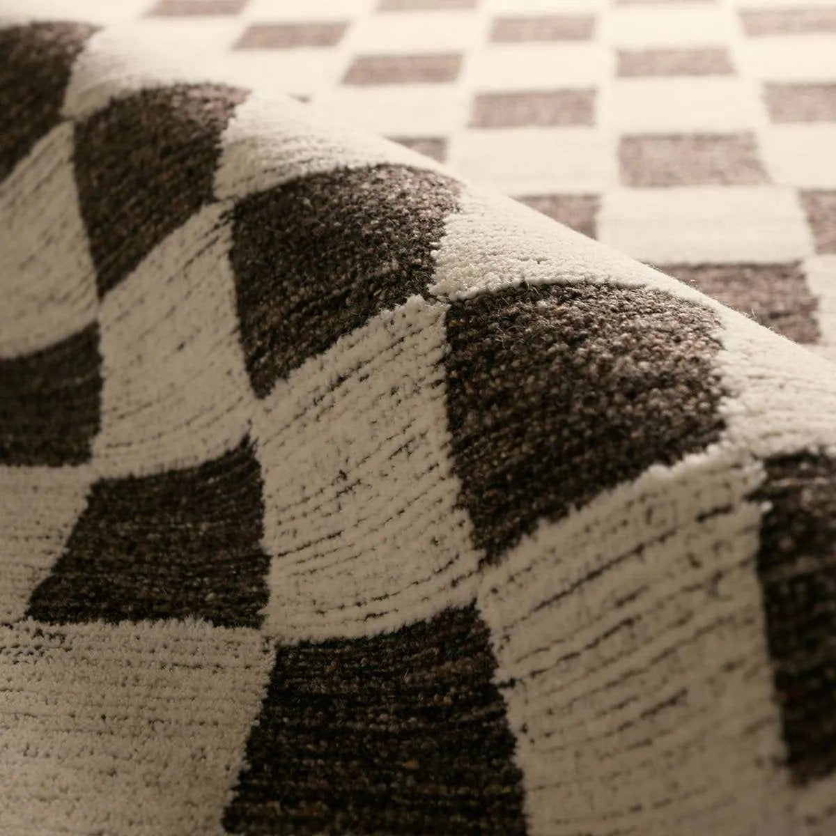 Featuring Tijara Rug by Jaipur Living at Amethyst Home. The Tijara design checks all the boxes. Handmade of 100% all-natural, undyed wool, this rug enjoys an understated elegance that is satisfying in its simplicity. Intricate overtufting brings a dynamic high-low pile to life, adding dimension. Easy to care for, durable, and undoubtedly modern, it exudes a qui. Amethyst Home provides interior design, new home construction design consulting, vintage area rugs, and lighting in the Tampa metro area.