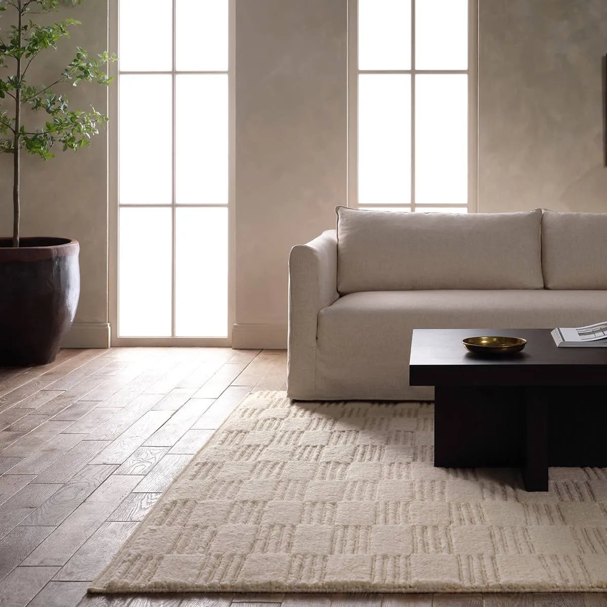 A contemporary twist on traditional Afghani hand-knotted textiles. The Keoka is crafted entirely from wool, featuring a ribbed construction that accentuates its dynamic checkerboard pattern with unique linear details. Complete with a dhurrie border, the Totto design adds a touch of global flair while remaining kid- and pet-friendly.Hand Knotte Amethyst Home provides interior design, new home construction design consulting, vintage area rugs, and lighting in the Boston metro area.