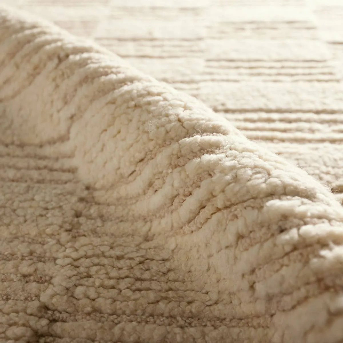 A contemporary twist on traditional Afghani hand-knotted textiles. The Keoka is crafted entirely from wool, featuring a ribbed construction that accentuates its dynamic checkerboard pattern with unique linear details. Complete with a dhurrie border, the Totto design adds a touch of global flair while remaining kid- and pet-friendly.Hand Knotte Amethyst Home provides interior design, new home construction design consulting, vintage area rugs, and lighting in the San Diego metro area.