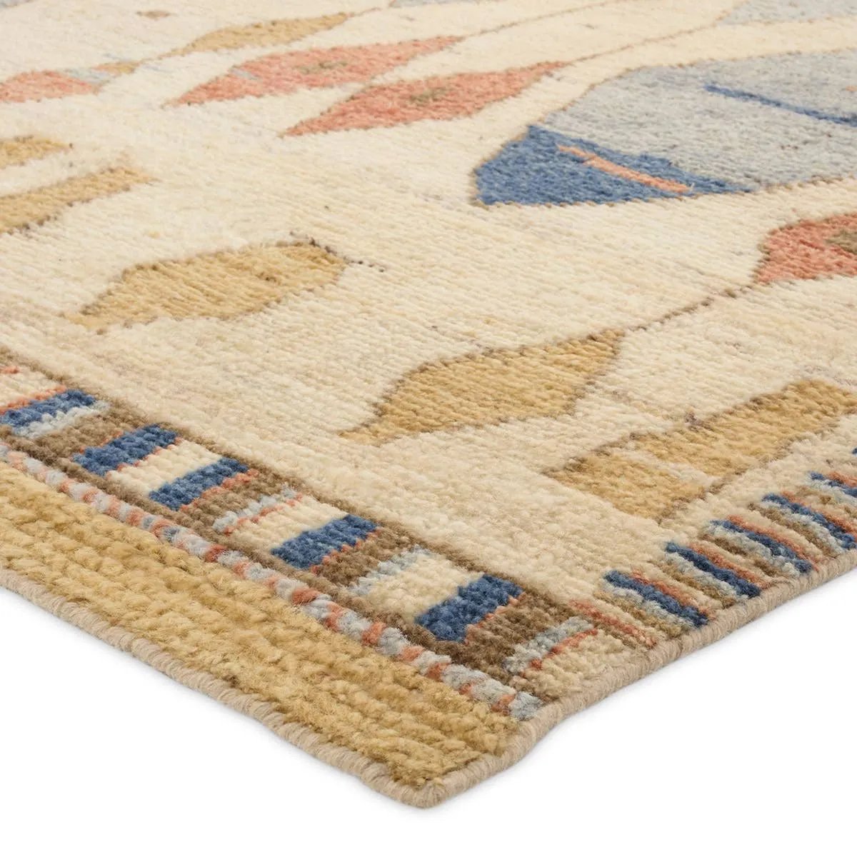 Enrich living spaces with the exotic allure of the Zaira Collection - a fusion of modern Moroccan designs and unparalleled craftsmanship. Handknotted in India with 22 knots per square inch, these rugs exude luxury and artistry. The Tonnara rug showcases an intriguing diamond pattern in beige, yellow, blue, and rust hues. Amethyst Home provides interior design, new home construction design consulting, vintage area rugs, and lighting in the Laguna Beach metro area.