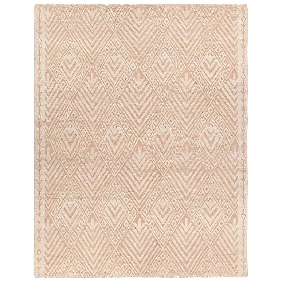 Envelop living spaces in the rich heritage of tribal artistry with the Zayda by Heja Home Palmeraie. These handknotted rugs, expertly crafted in India using 100% wool, exude a mesmerizing blend of tribal charm and timeless geometric elegance. The Palmeraie design features a globally inspired, geometric diamond design in a brown and tan colorway. Amethyst Home provides interior design, new home construction design consulting, vintage area rugs, and lighting in the Calabasas metro area.