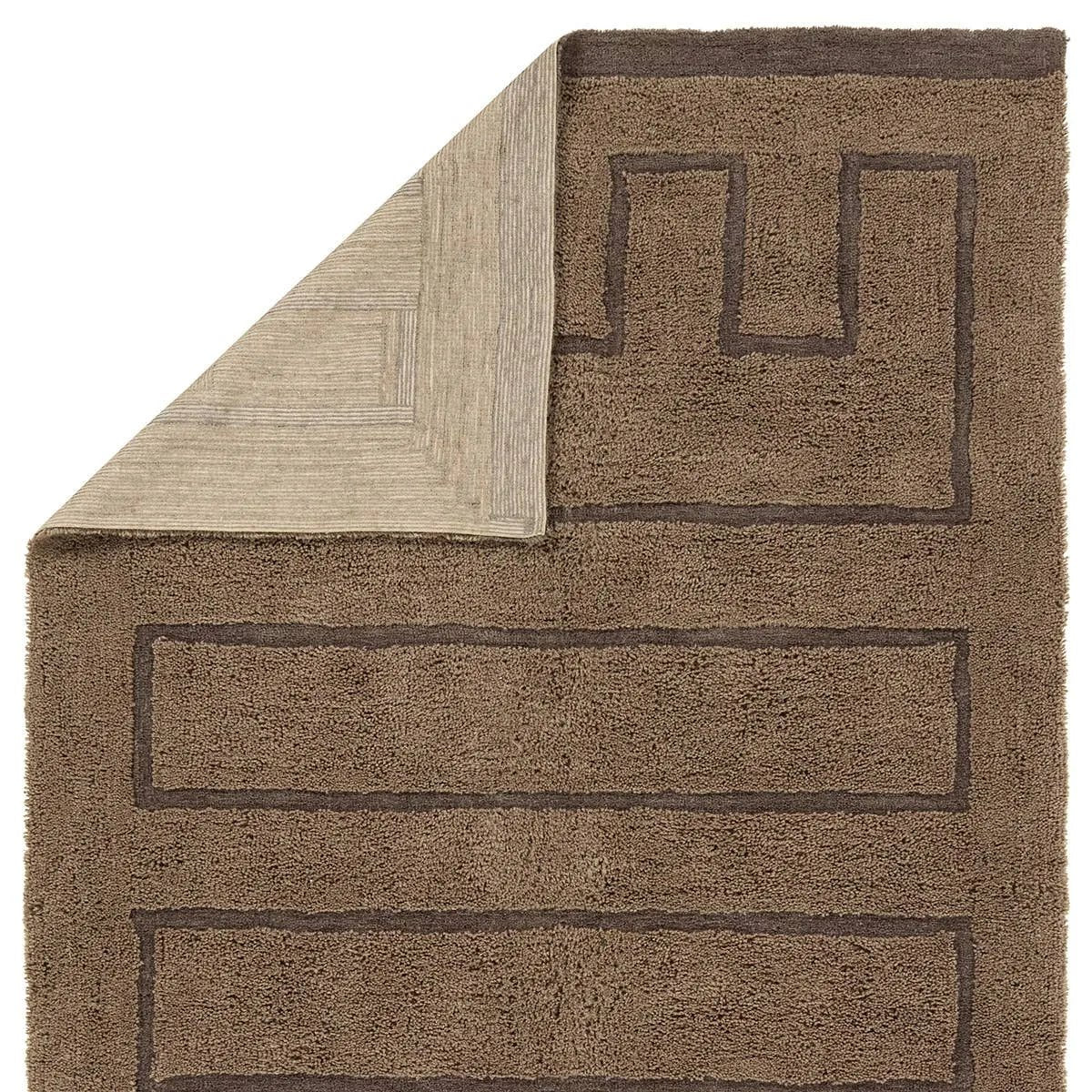 With its neutral brown hue and modern geometric pattern, the Aibel Ziyan adds a contemporary touch to your space. Hand-tufted from washable wool and offering plush comfort, it’s ideal for kids’ rooms or any area where spills are bound to happen. Here’s a stylish, worry-free solution that can handle the demands of everyday life.Hand Tufte Amethyst Home provides interior design, new home construction design consulting, vintage area rugs, and lighting in the Salt Lake City metro area.