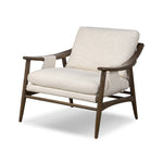 Featuring Kimmery Omari Natural Chair by Four Hands at Amethyst Home. Made with a thick-weave high-performance fabric, a sling-style chair features feather- and fiber-blend cushions for comfort, with clean boxing detailing. Between tapered oak legs, stretchers shape a slight arch, for an intriguing design detail. Performance fabrics are specially created to withstand spills, stains. Amethyst Home provides interior design, new construction, custom furniture, and area rugs in the Portland metro area