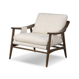 Featuring Kimmery Omari Natural Chair by Four Hands at Amethyst Home. Made with a thick-weave high-performance fabric, a sling-style chair features feather- and fiber-blend cushions for comfort, with clean boxing detailing. Between tapered oak legs, stretchers shape a slight arch, for an intriguing design detail. Performance fabrics are specially created to withstand spills, stains. Amethyst Home provides interior design, new construction, custom furniture, and area rugs in the Portland metro area