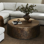 Featuring Kipp Burnt Bleached Oak Resawn Coffee Table by Four Hands at Amethyst Home. A drum-style table is wrapped in distressed aluminum with a rust finish, for a unique acid-wash effect. Topped with resawn oak which has been sun-bleached and torch-burned for both texture and character.Overall Dimensions: 47.50"w x 47.50"d x 16.00"hWeight : 136.69 lbsMaterials : Resawn Oak, Sol. Amethyst Home provides interior design, new construction, custom furniture, and area rugs in the Alpharetta metro area