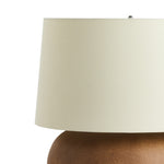 Featuring Kragen Dark Sand Porcelain Ceramic Table Lamp by Four Hands at Amethyst Home. A wide table lamp of sand-finished ceramic pairs with an ivory shade of flax and linen.Overall Dimensions: 18.00"w x 18.00"d x 23.00"hWeight : 18.76 lbsMaterials : Ceramic, 65% Polyester, 35% Flax/Linen. Amethyst Home provides interior design, new construction, custom furniture, and area rugs in the Alpharetta metro area