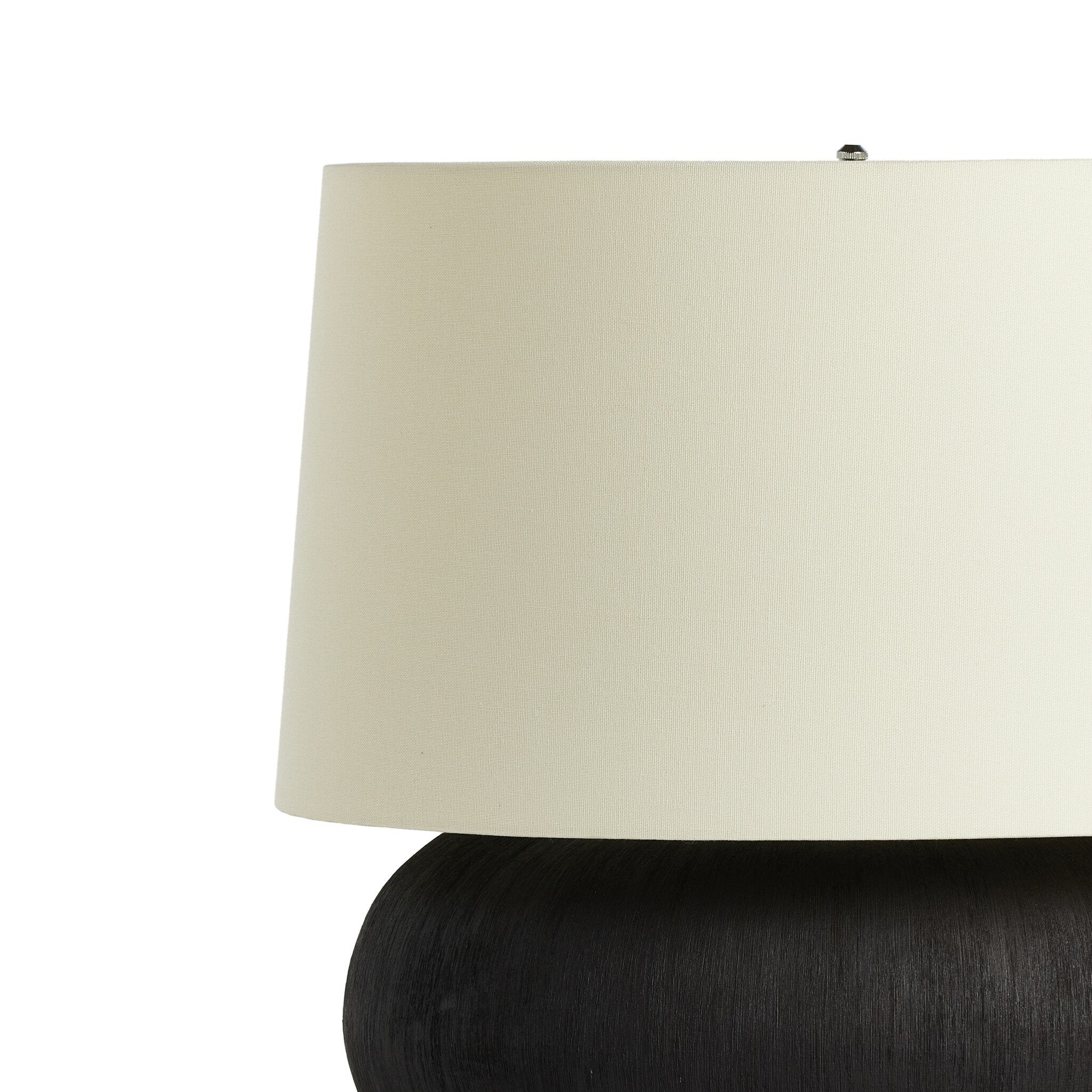 Featuring Kragen Textured Matte Black Porcelain Ceramic Table Lamp by Four Hands at Amethyst Home. A wide, textured table lamp of black-finished ceramic pairs with an ivory shade of flax and linen.Overall Dimensions: 18.00"w x 18.00"d x 23.00"hWeight : 19.27 lbsMaterials : Ceramic, 65% Polyester, 35% Flax/Linen. Amethyst Home provides interior design, new construction, custom furniture, and area rugs in the San Diego metro area