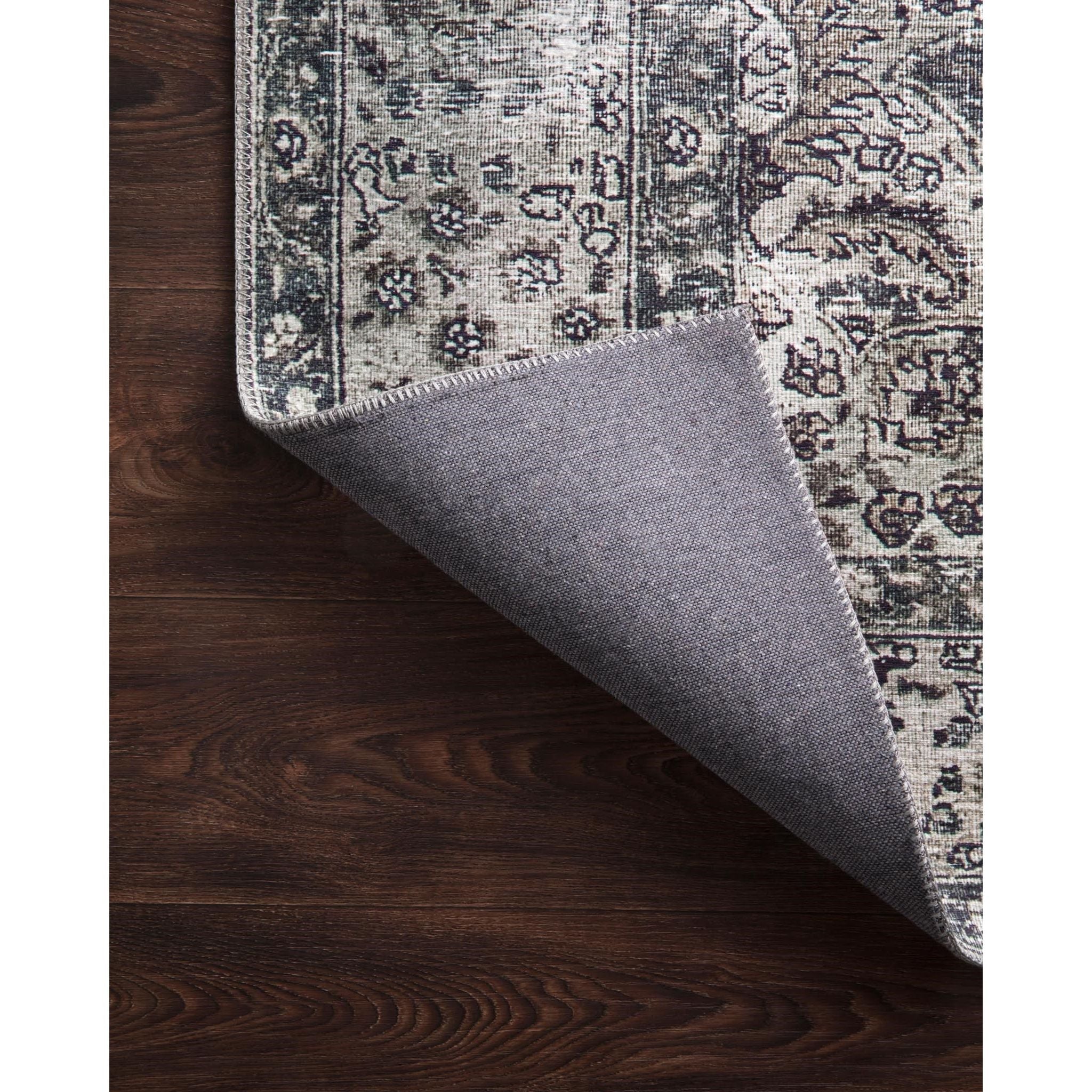 Featuring Layla Taupe/Stone Runner by Loloi at Amethyst Home. The Layla Collection is traditional and timeless, with a beautiful lived-in design that captures the spirit of an old-world rug. This traditional power-loomed rug is crafted of 100% polyester with a classic and sophisticated color palette and subtle patina.

Power Loomed100% PolyesterLAY-06 Taupe/S.  Amethyst Home provides interior design, new home construction design consulting, vintage area rugs, and lighting in the Dallas metro area.