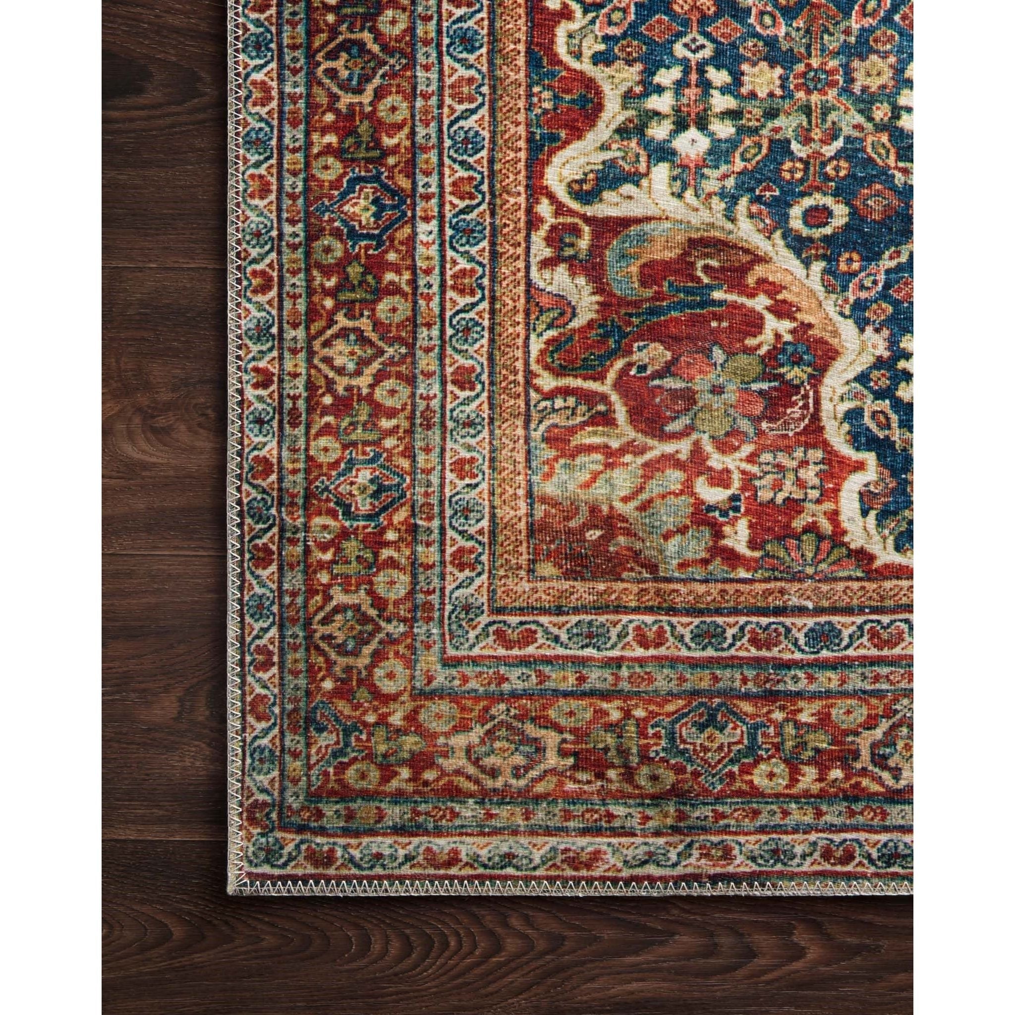 Featuring Layla Blue/Spice Runner by Loloi at Amethyst Home. The Layla Blue / Spice area rug from Loloi captures the spirit of an old-world rug. Our customers love this rug because: 

Perfect for families with kids and pets
Very easy to clean and maintain
Comes in big area rug sizes and as cute kitchen and hallway runners
Looks gorgeous with the intricate .  Amethyst Home provides interior design, new home construction design consulting, vintage area rugs, and lighting in the Calabasas metro area.