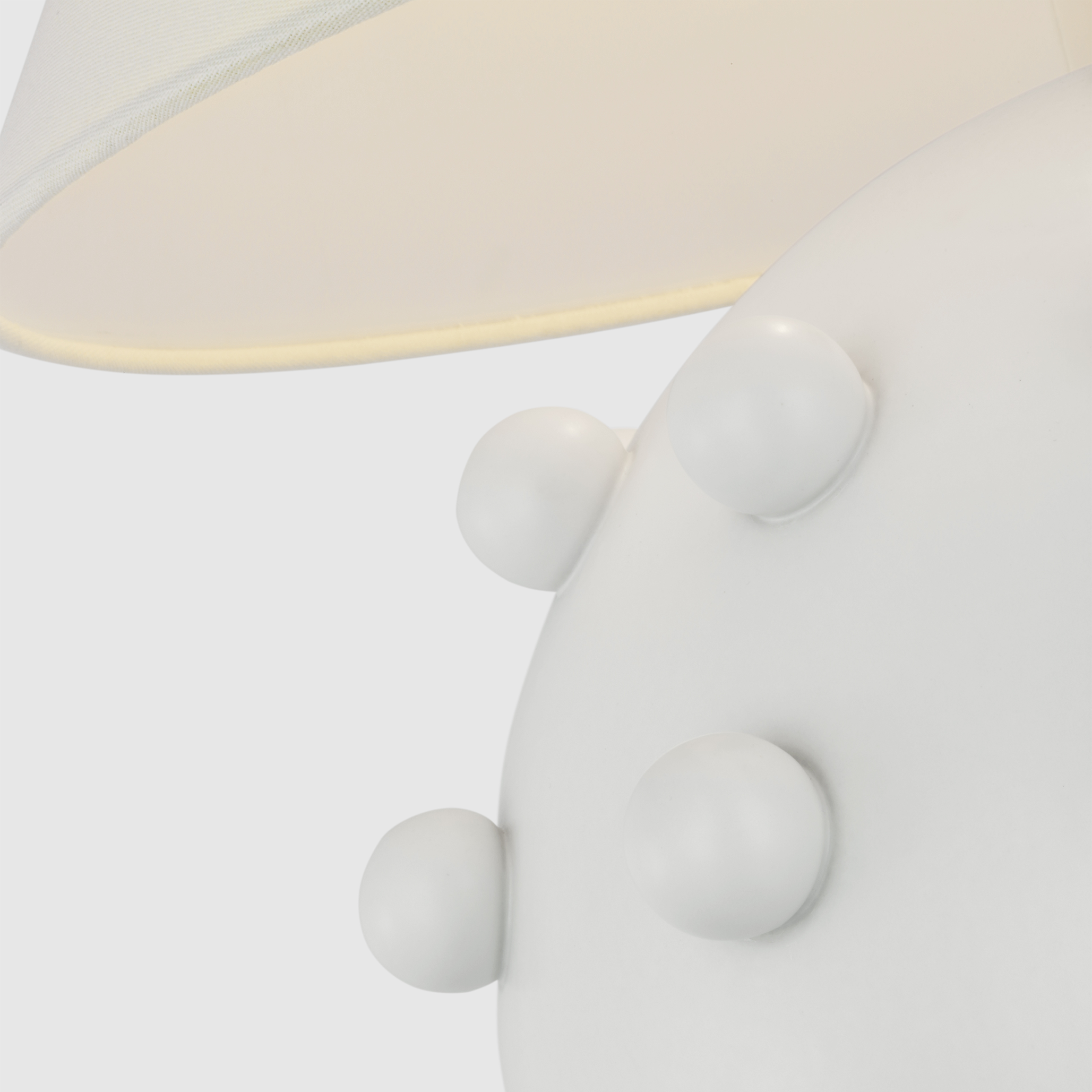 Featuring Linden Plaster White Medium Orb Table Lamp by Visual Comfort at Amethyst Home. The Linden is an exploration of bold forms in a simple palette of rich metallic accents, with white and black. Modern and sophisticated curved lines and spherical silhouettes contrast with straight edges to lend interiors a contemporary Kelly Wearstler accent.
Overall Dimensions: 21" L x 21" W x 2. Amethyst Home provides interior design, new construction, custom furniture, and area rugs in the Omaha metro area