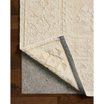 The Alara Collection is a unique and refined area rug that combines finely spun jute with chunky wool for dynamic pile juxtaposition. A neutral ivory palette with natural color variation makes it an elegant addition to home decor in living rooms, bedrooms, and more. Amethyst Home provides interior design, new home construction design consulting, vintage area rugs, and lighting in the Winter Garden metro area.