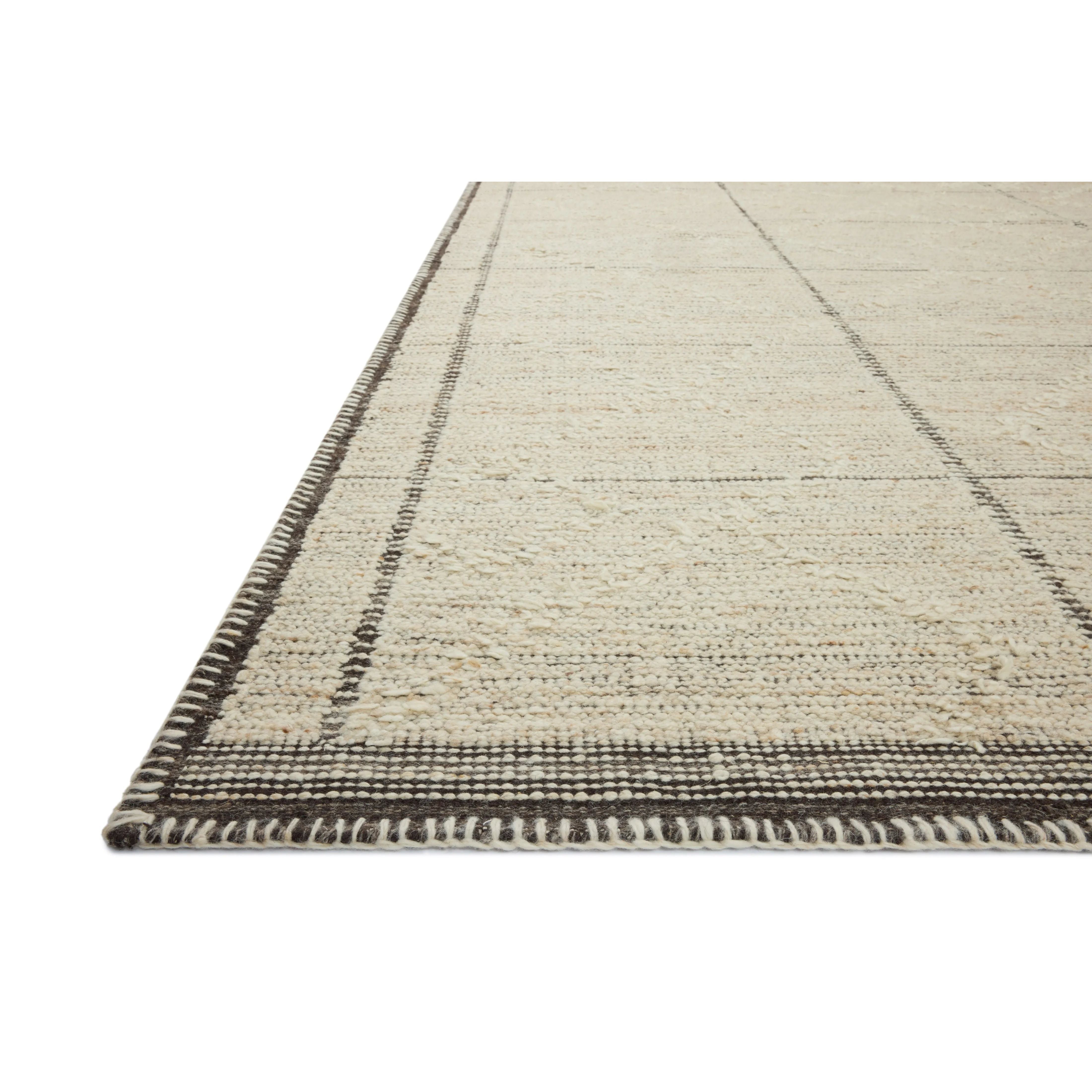 Beautifully crafted by hand, the Bowie Collection by Amber Lewis x Loloi is a textured area rug with an earthy, organic aesthetic. The pile has a flatweave base with chunkier, slightly raised geometric motifs and whipstitched edges. It’s an elegant yet easy-to-work-with rug for living rooms, bedrooms, and other high-traffic areas of the home. Amethyst Home provides interior design, new home construction design consulting, vintage area rugs, and lighting in the Los Angeles metro area.