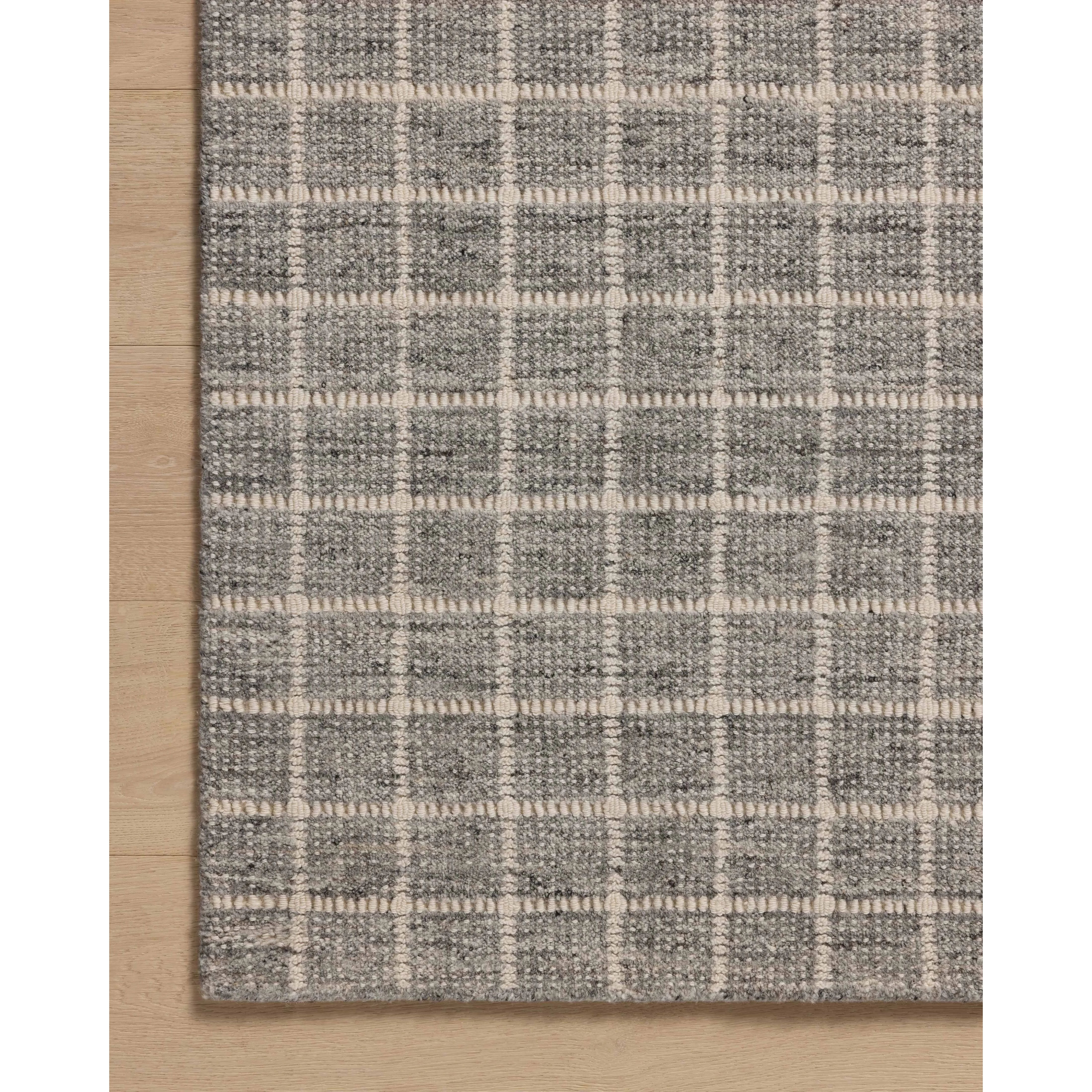 Featuring Amber Lewis x Loloi Cedar Charcoal / Ivory Rug by Loloi at Amethyst Home. The Cedar Collection by Amber Lewis x Loloi is a hand-loomed area rug with a clean gridded design in contrasting ivory. The blended wool and cotton pile of the rug is substantial and soft, with flecked tones that add depth to the neutral palette. This collection is hand. Amethyst Home provides interior design, new home construction design consulting, vintage area rugs, and lighting in the Salt Lake City metro area.