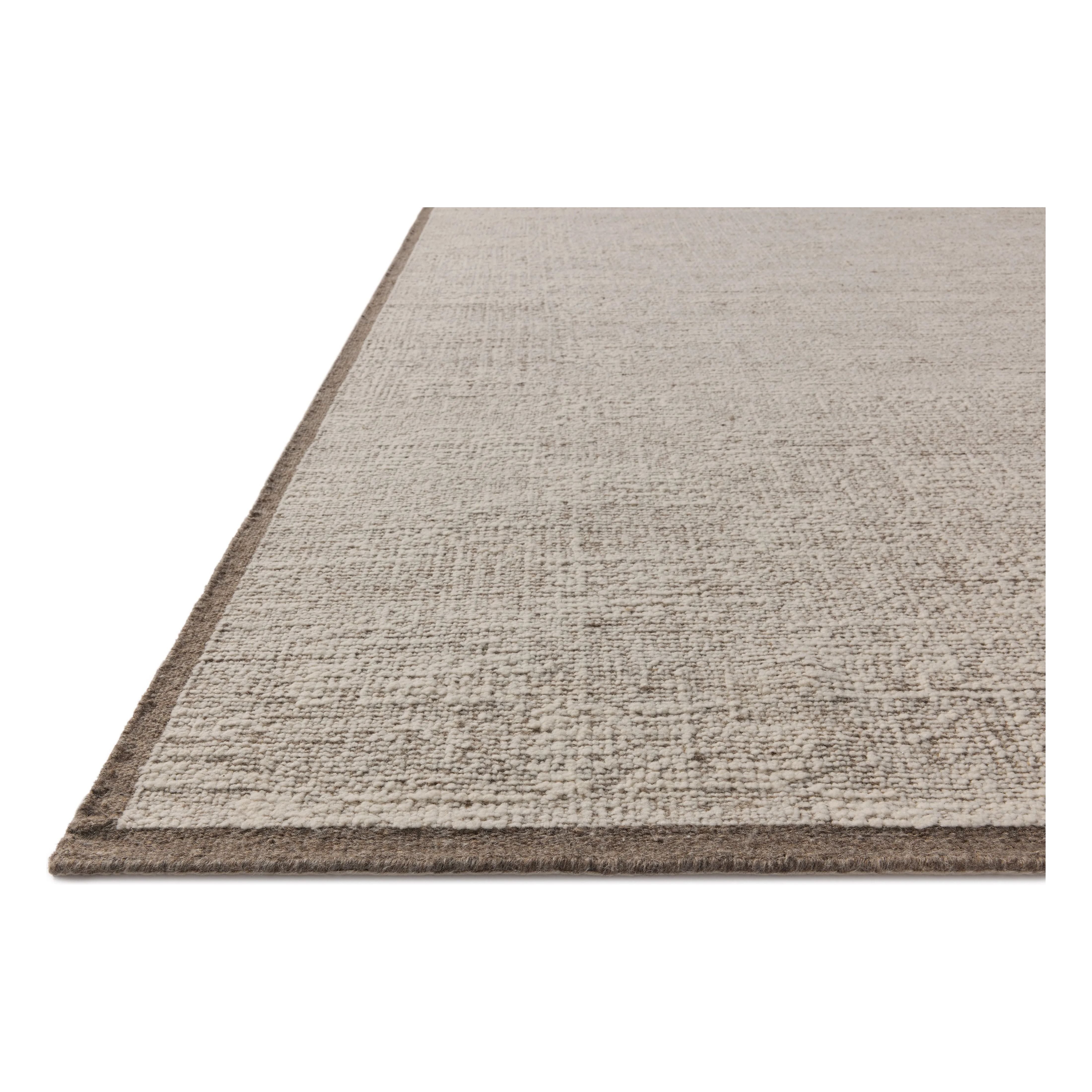 The Dakota Collection by Amber Lewis x Loloi is a flatweave-style area rug with a muted checkerboard pattern framed with a deeper-toned border. The rug is hand-woven of wool and cotton for a durable, natural warmth in living rooms, bedrooms, and more. Amethyst Home provides interior design, new home construction design consulting, vintage area rugs, and lighting in the Boston metro area.