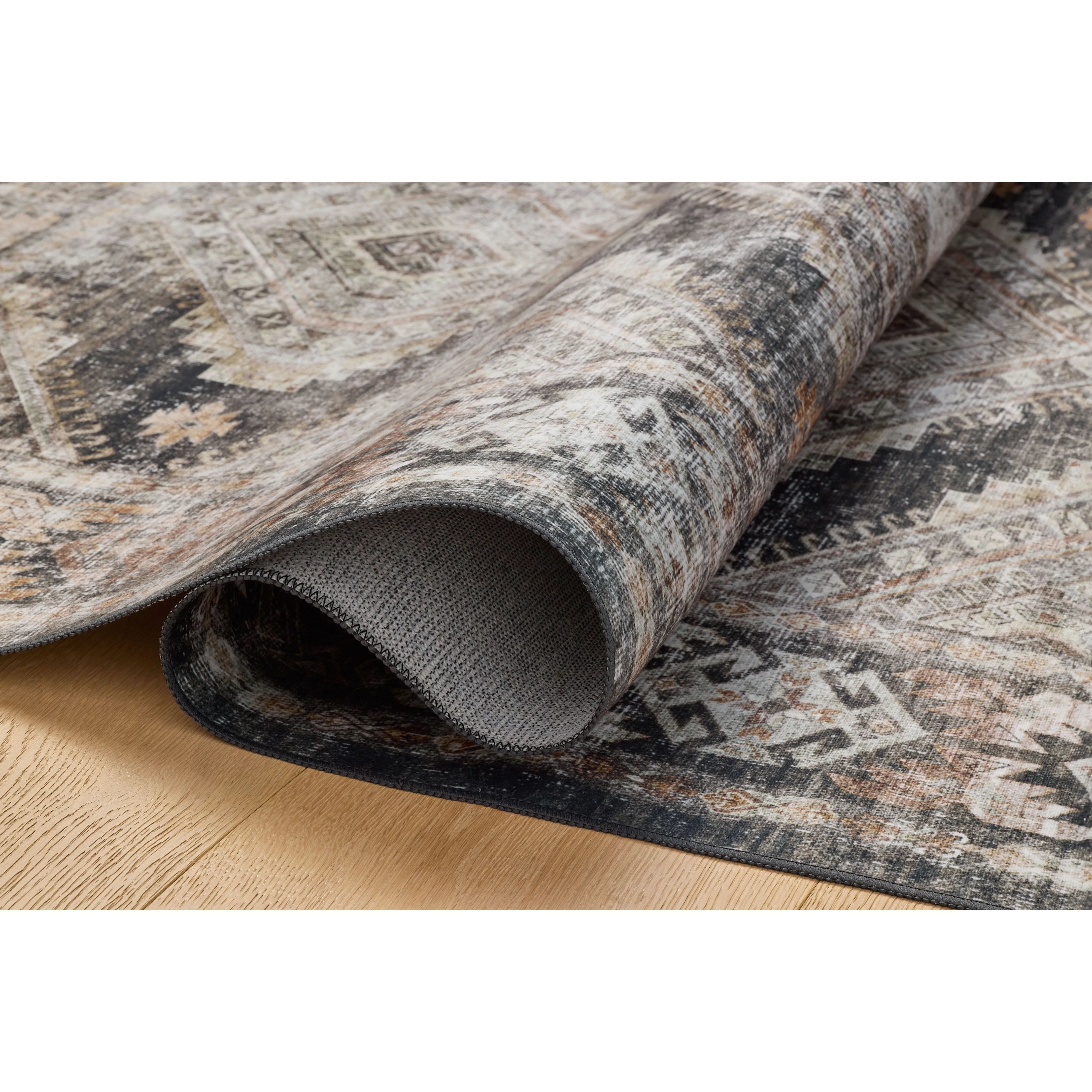The Josie Collection is a machine-washable area rug with an exceptional design by Amber Lewis x Loloi. The rugs beautiful, vintage-inspired motifs in rich, earthy tones raise the standard for washable rugs. Amethyst Home provides interior design, new home construction design consulting, vintage area rugs, and lighting in the Miami metro area.
