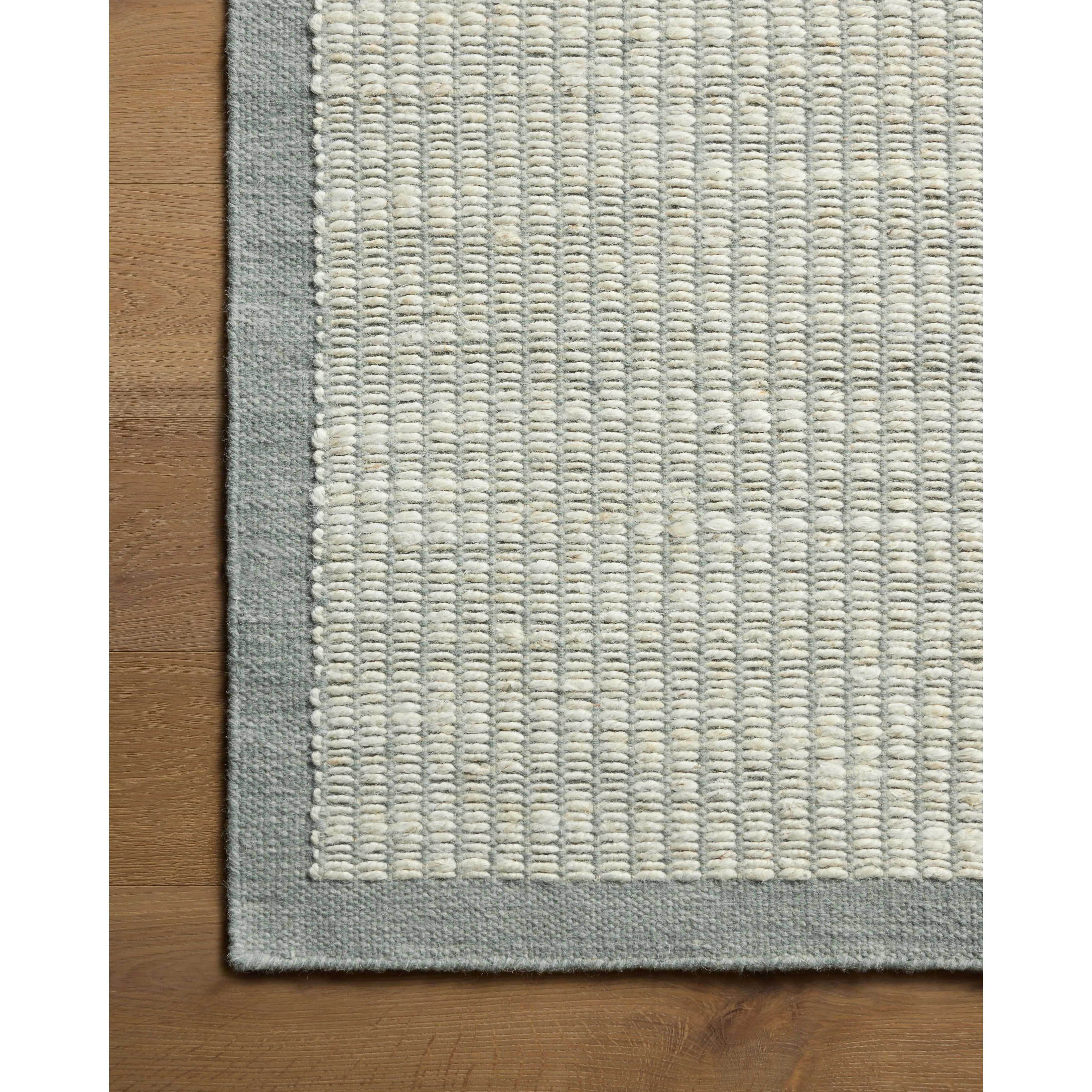 The Lilah Collection by Amber Lewis x Loloi is a hand-woven area rug with the designer’s signature earthy, organic aesthetic. Small details, like the flatweave framing around the rug’s border, add a juxtaposing texture to the ribbed jute and elevate this essential collection for living rooms, dining rooms, and more. Amethyst Home provides interior design, new home construction design consulting, vintage area rugs, and lighting in the Scottsdale metro area.