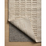 The Monty Collection by Amber Lewis x Loloi is a modern interpretation of richly piled Moroccan rugs in a refreshingly neutral color palette. The rugs abstract designs create a high-low texture in the pile for feet to sink into. Amethyst Home provides interior design, new home construction design consulting, vintage area rugs, and lighting in the Newport Beach metro area.