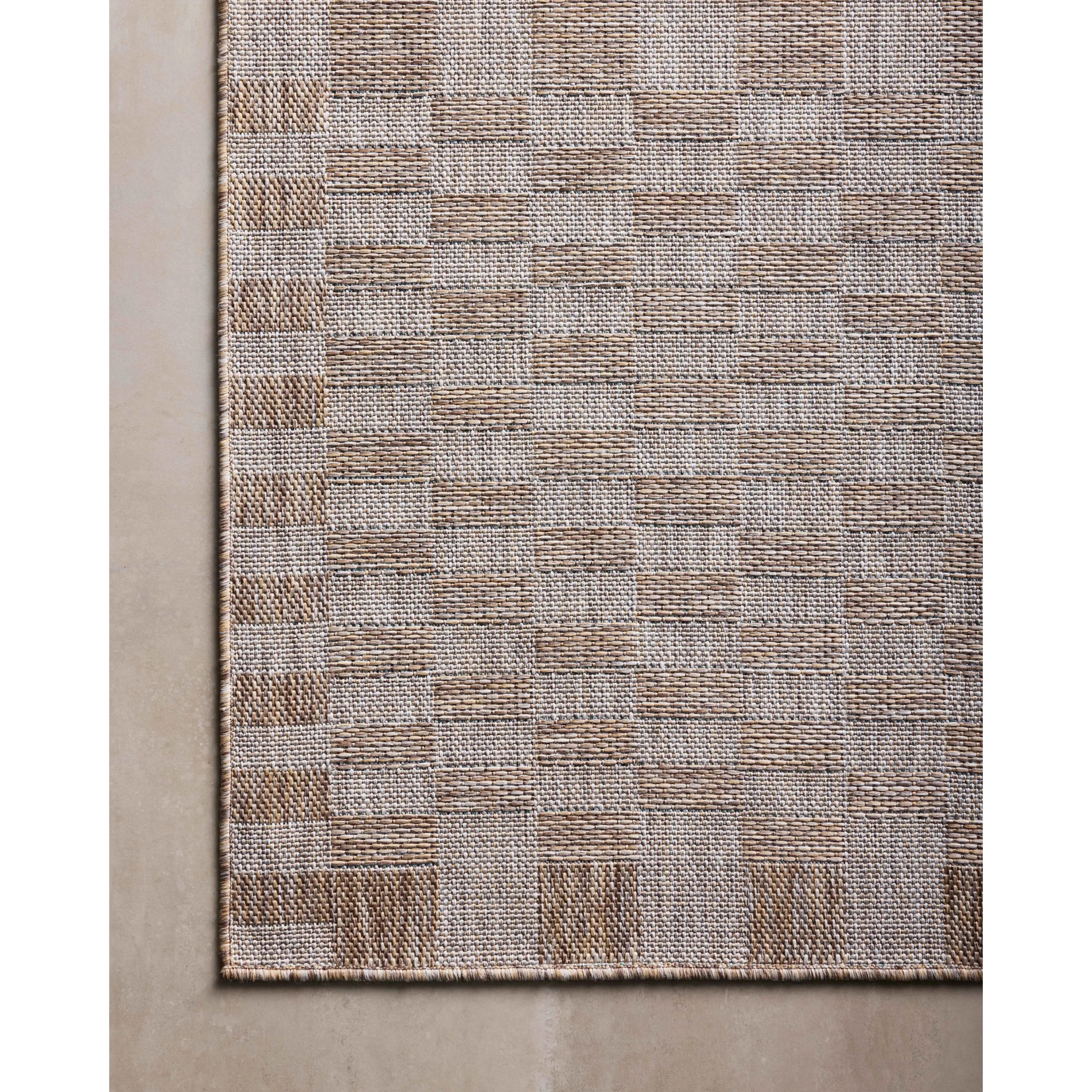 Inspired by the scenic mountain town in California, the Topanga Collection is an indoor/outdoor rug made of durable polypropylene that resembles natural fibers but is much more ready for sun, rain, and high-traffic use. Amethyst Home provides interior design, new home construction design consulting, vintage area rugs, and lighting in the Dallas metro area.