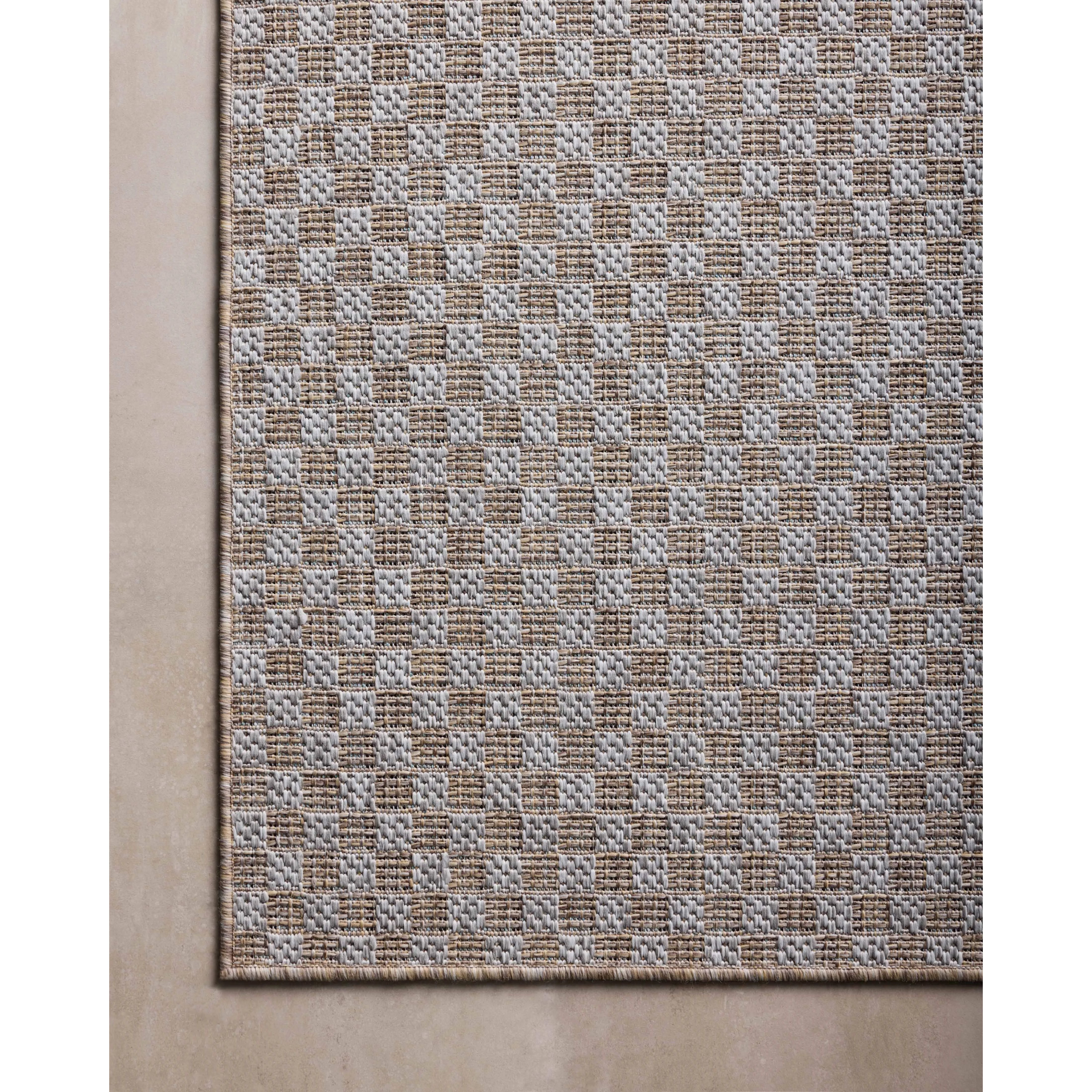 Inspired by the scenic mountain town in California, the Topanga Collection is an indoor/outdoor rug made of durable polypropylene that resembles natural fibers but is much more ready for sun, rain, and high-traffic use. Amethyst Home provides interior design, new home construction design consulting, vintage area rugs, and lighting in the Dallas metro area.