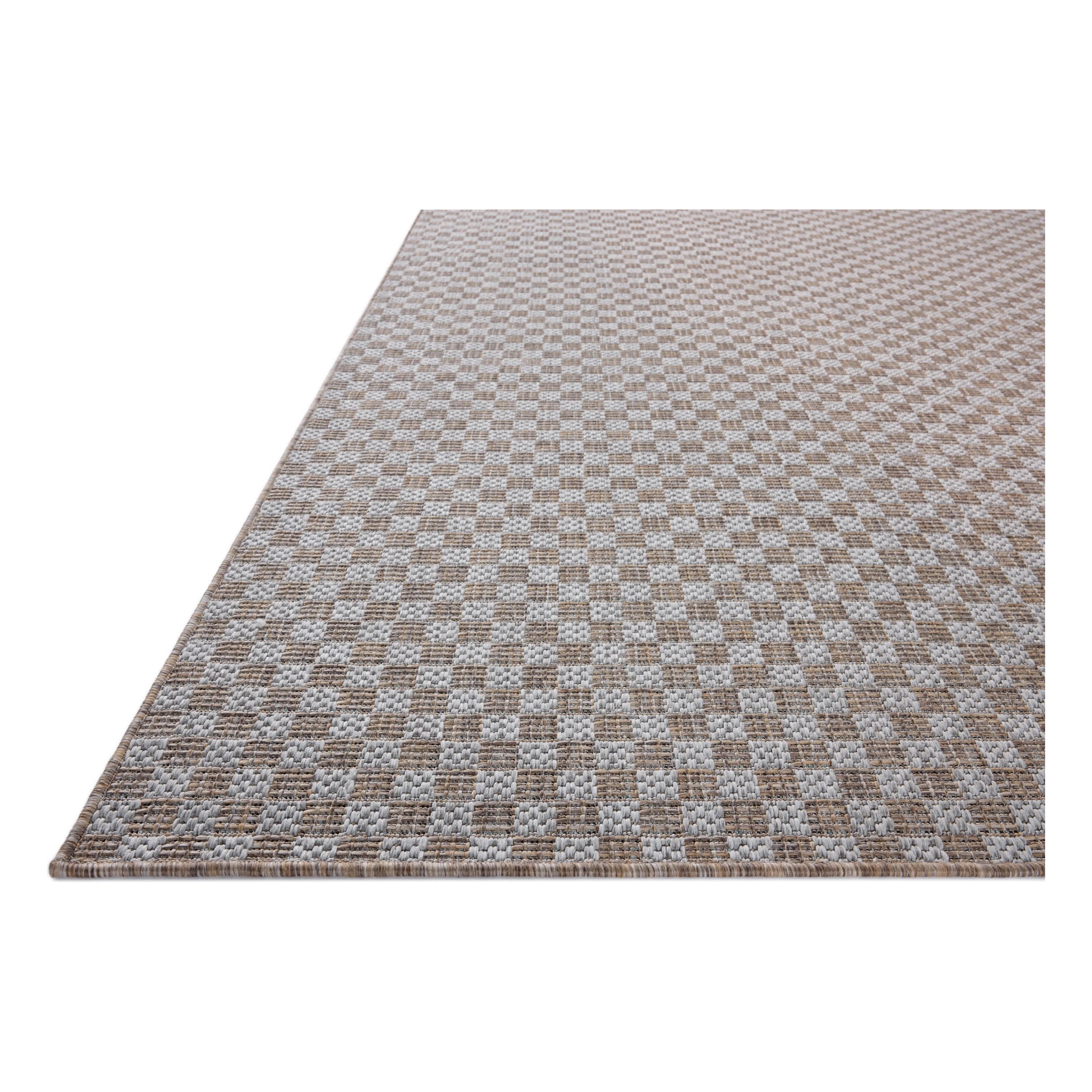 Inspired by the scenic mountain town in California, the Topanga Collection is an indoor/outdoor rug made of durable polypropylene that resembles natural fibers but is much more ready for sun, rain, and high-traffic use. Amethyst Home provides interior design, new home construction design consulting, vintage area rugs, and lighting in the Laguna Beach metro area.