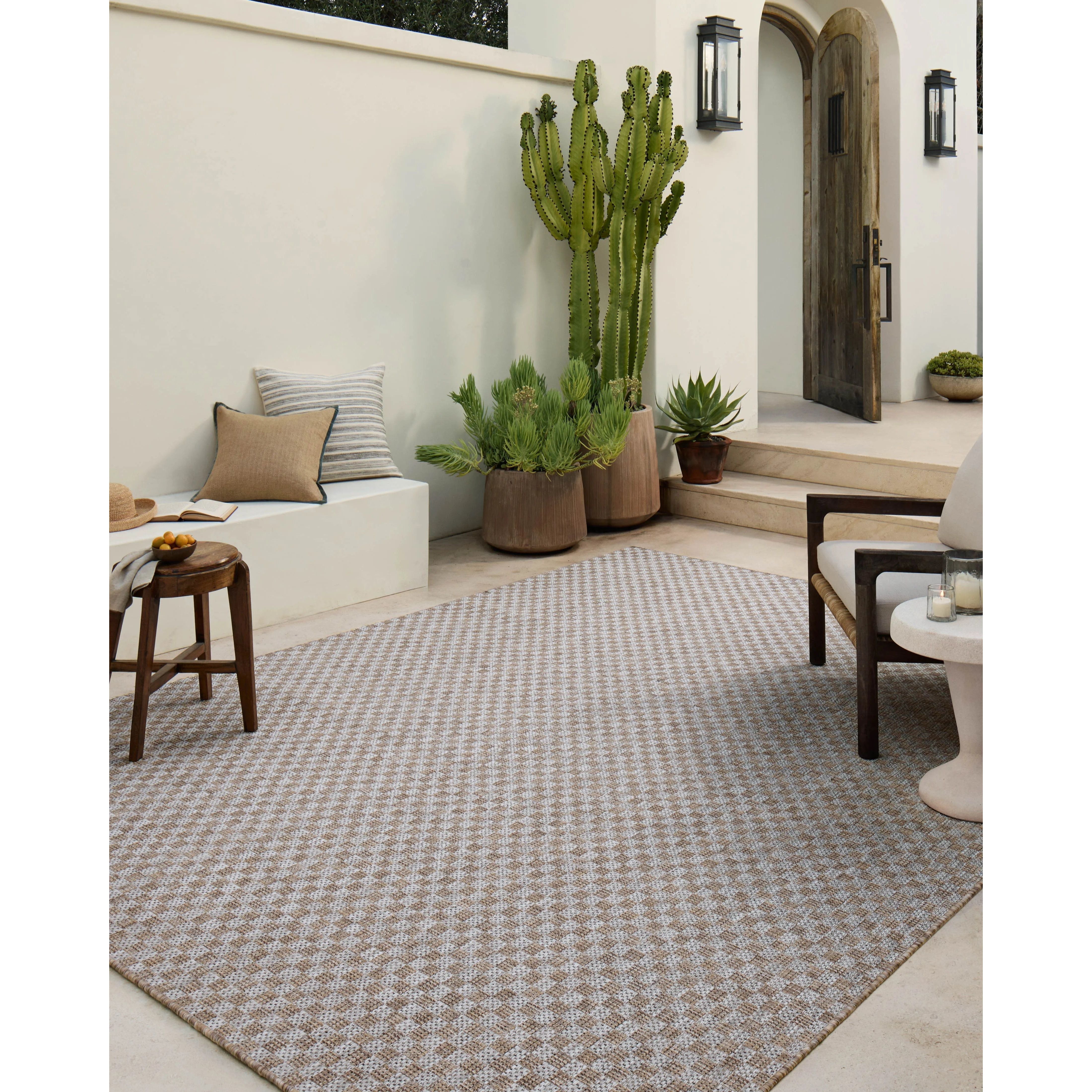 Inspired by the scenic mountain town in California, the Topanga Collection is an indoor/outdoor rug made of durable polypropylene that resembles natural fibers but is much more ready for sun, rain, and high-traffic use. Amethyst Home provides interior design, new home construction design consulting, vintage area rugs, and lighting in the Scottsdale metro area.