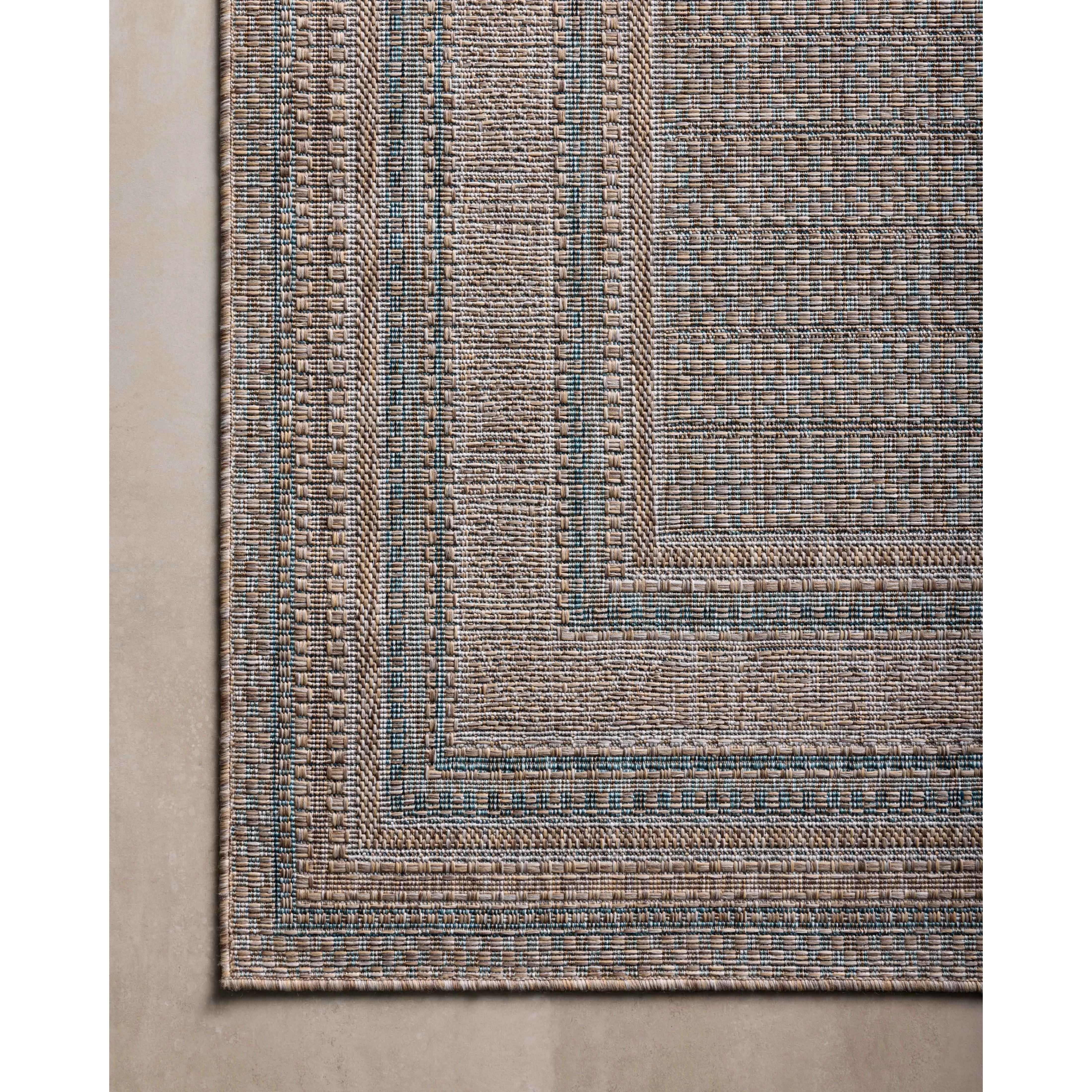 Inspired by the scenic mountain town in California, the Topanga Collection is an indoor/outdoor rug made of durable polypropylene that resembles natural fibers but is much more ready for sun, rain, and high-traffic use. Amethyst Home provides interior design, new home construction design consulting, vintage area rugs, and lighting in the Washington metro area.