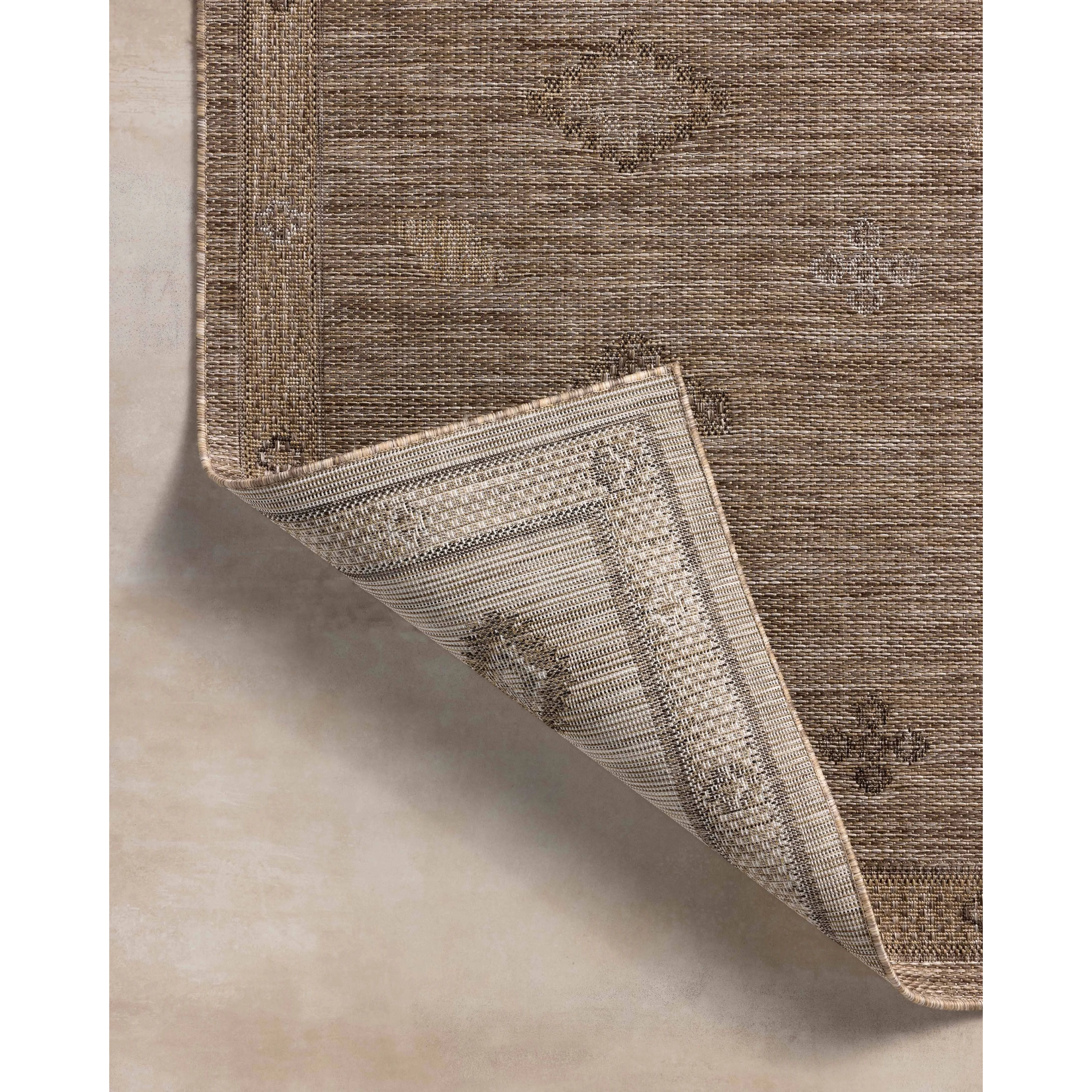 The Birch Collection is a cool-toned area rug with an understated linear design that adds casual structure to contemporary home decor. The rug is power-loomed of durable polyester, an easy-to-clean, no-shed construction for the busiest rooms of the home. Amethyst Home provides interior design, new home construction design consulting, vintage area rugs, and lighting in the Charlotte metro area.