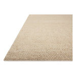 With versatile earth tones and a chunky, hand-knotted texture resembling tiny pebbles, the Frida Bone Rug by Brigette Romanek x Loloi can ground any room with a sense of elevated ease. Each area rug features a subtle nuance in color variation due to the handmade nature of its construction and has a pleasantly nubby softness underfoot. Amethyst Home provides interior design, new home construction design consulting, vintage area rugs, and lighting in the Calabasas metro area.