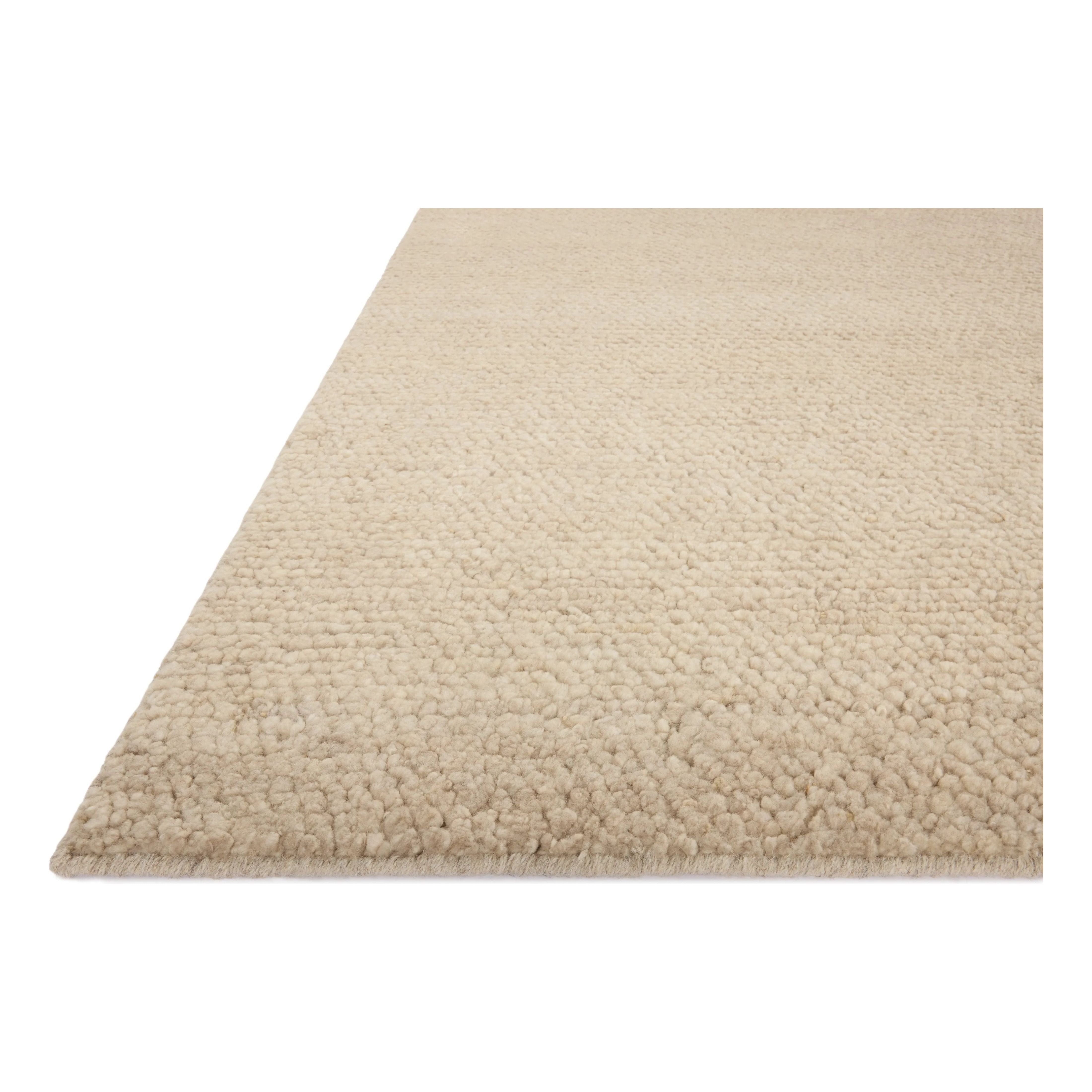 With versatile earth tones and a chunky, hand-knotted texture resembling tiny pebbles, the Frida Bone Rug by Brigette Romanek x Loloi can ground any room with a sense of elevated ease. Each area rug features a subtle nuance in color variation due to the handmade nature of its construction and has a pleasantly nubby softness underfoot. Amethyst Home provides interior design, new home construction design consulting, vintage area rugs, and lighting in the Calabasas metro area.