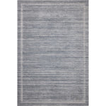 Irresistible to walk upon, the Dana Denim Rug by Brigette Romanek x Loloi has a high-low texture that alternates between a subtly shaggy pile and a soft base. Horizontal broken stripes give the area rug a fresh and energized structure, while a finish of fringe along the edges accentuates its sense of movement. Amethyst Home provides interior design, new home construction design consulting, vintage area rugs, and lighting in the Portland metro area.