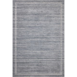 Irresistible to walk upon, the Dana Denim Rug by Brigette Romanek x Loloi has a high-low texture that alternates between a subtly shaggy pile and a soft base. Horizontal broken stripes give the area rug a fresh and energized structure, while a finish of fringe along the edges accentuates its sense of movement. Amethyst Home provides interior design, new home construction design consulting, vintage area rugs, and lighting in the Portland metro area.