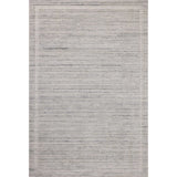 Irresistible to walk upon, the Dana Stone Rug by Brigette Romanek x Loloi has a high-low texture that alternates between a subtly shaggy pile and a soft base. Horizontal broken stripes give the area rug a fresh and energized structure, while a finish of fringe along the edges accentuates its sense of movement. Amethyst Home provides interior design, new home construction design consulting, vintage area rugs, and lighting in the Miami metro area.