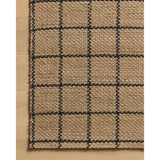 The Fletcher Collection from Chris Loves Julia x Loloi is a power-loomed jute rug with a large-scale grid pattern for an organic modern twist on a classic style. The rugs chunky texture and checkerboard-detailed lines are the refined details that Chris Loves Julia is known for, while the rugs natural palette allows for easy styling in any room. Amethyst Home provides interior design, new home construction design consulting, vintage area rugs, and lighting in the Charlotte metro area.