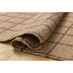 Featuring Chris Loves Julia × Loloi Fletcher Natural / Brown Rug by Loloi at Amethyst Home. The Fletcher Collection from Chris Loves Julia x Loloi is a power-loomed jute rug with a large-scale grid pattern for an organic modern twist on a classic style. The rugs chunky texture and checkerboard-detailed lines are the refined details that Chris Loves Julia . Amethyst Home provides interior design, new home construction design consulting, vintage area rugs, and lighting in the Kansas City metro area.