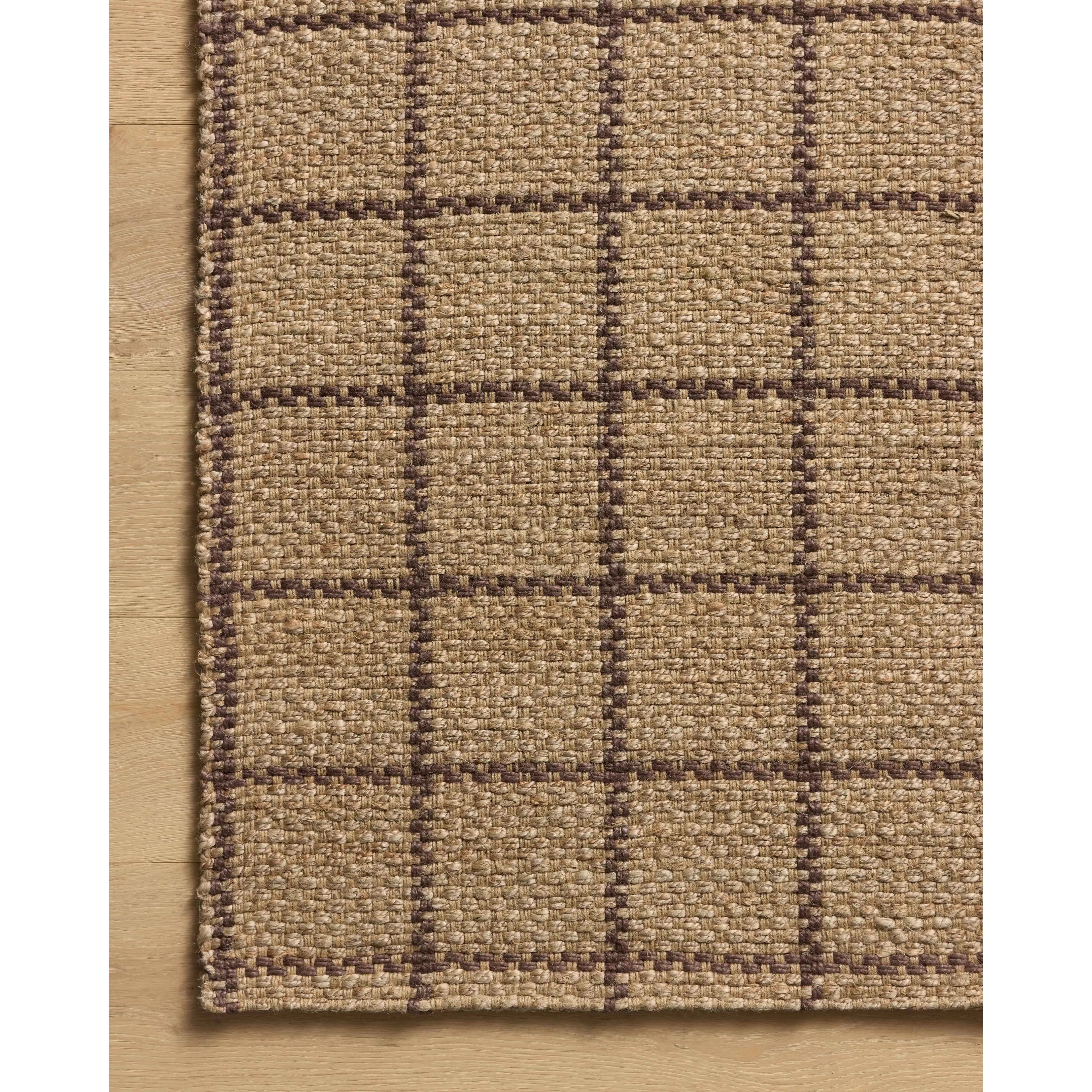 Featuring Chris Loves Julia × Loloi Fletcher Natural / Brown Rug by Loloi at Amethyst Home. The Fletcher Collection from Chris Loves Julia x Loloi is a power-loomed jute rug with a large-scale grid pattern for an organic modern twist on a classic style. The rugs chunky texture and checkerboard-detailed lines are the refined details that Chris Loves Julia is. Amethyst Home provides interior design, new home construction design consulting, vintage area rugs, and lighting in the San Diego metro area.